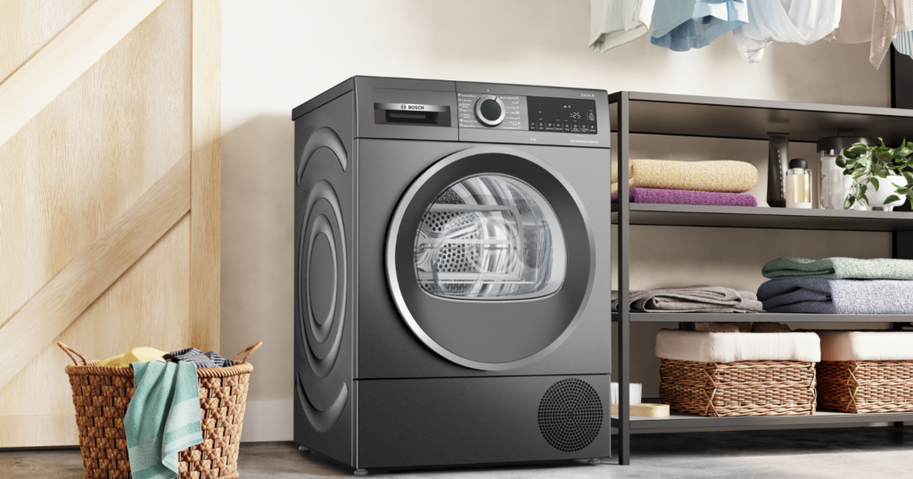 Cuarto de lavado con secadora con bomba de calor Bosch en acero antracita antihuellas.